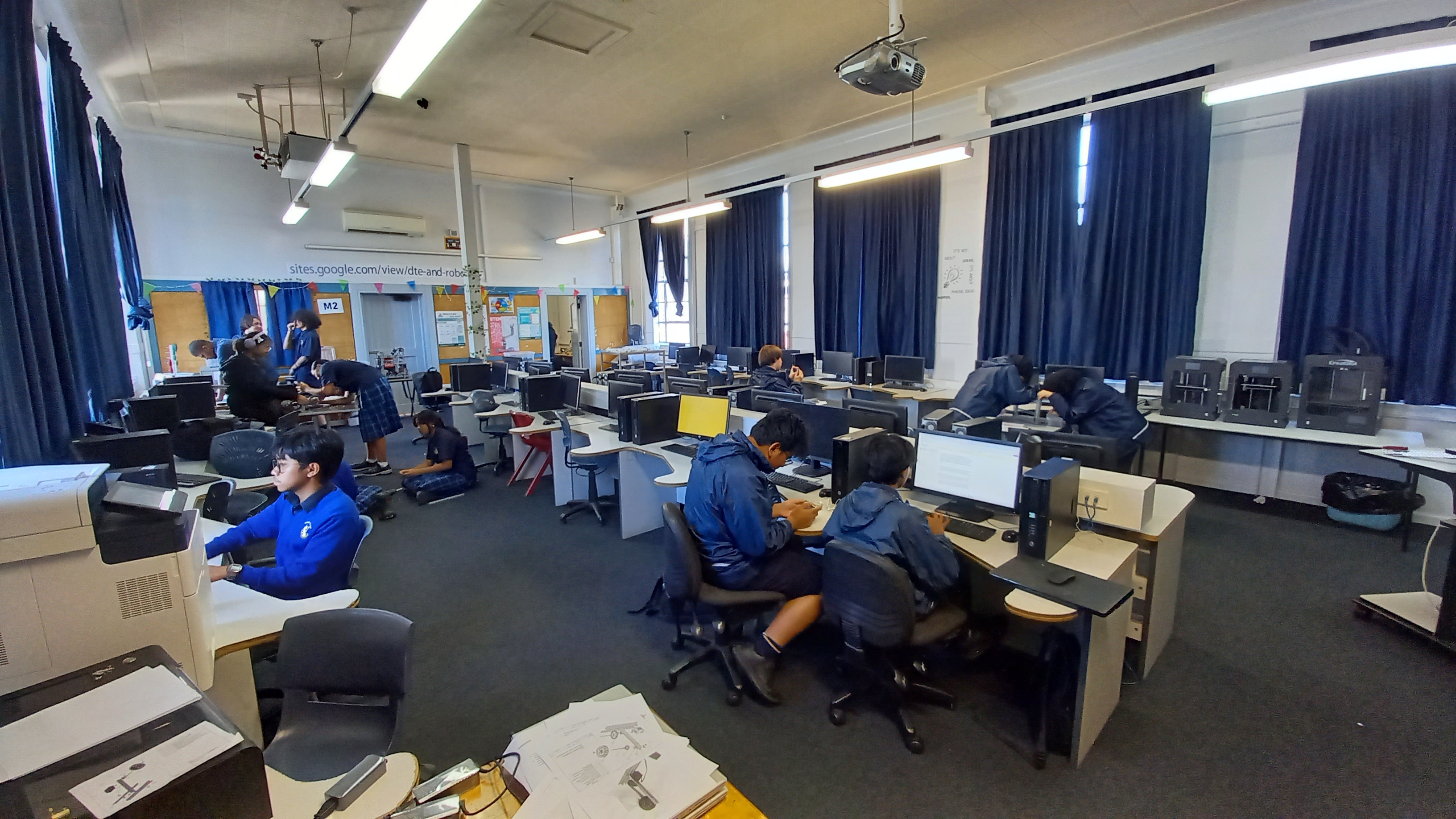 Students learning coding and robotics